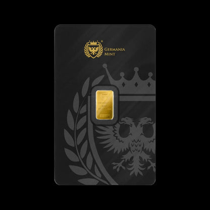 Gold bar in a black holder with 'Germania Mint' branding on a black background